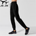 2020 Trabajo casual Tie Women Mujeres elásticas Jogger Pantalones largos con bolsillos Pantalones de chándal ajustados